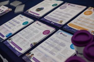 Perfectus Biomed Service offering leaflets at a conference